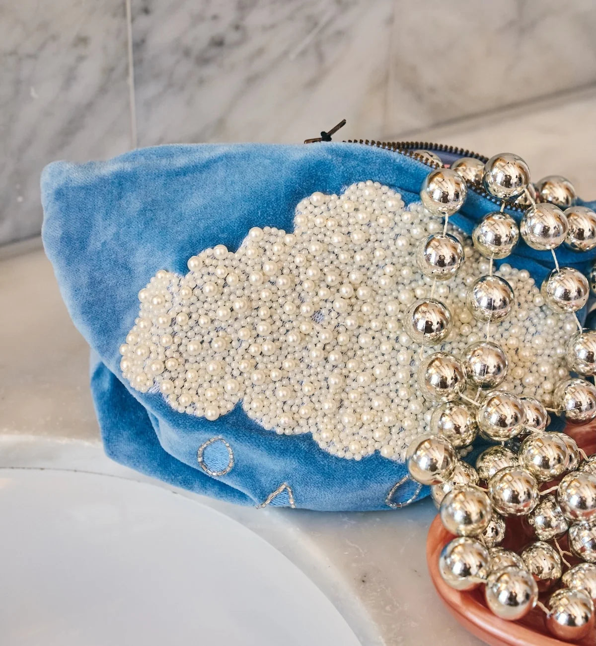 The beaded pearly make up bag